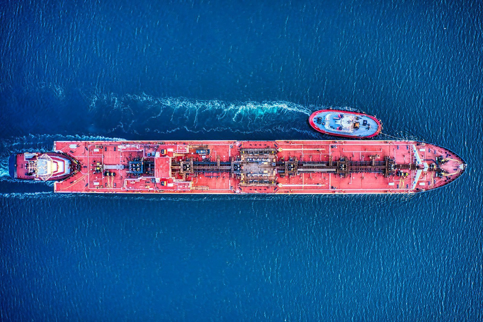 aerial view of city buildings beside body of water during daytime